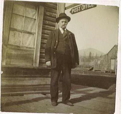 Postmaster Mr. Keyes, Chewelah Post Office. Taken about 1893.